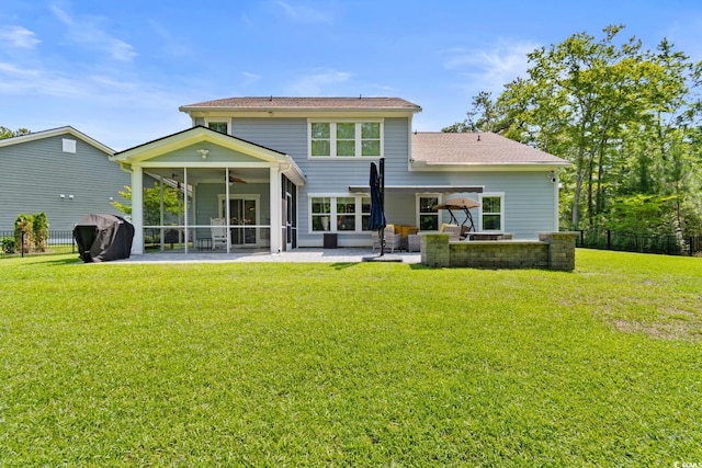 818 Mourning Dove Dr, Myrtle Beach, SC 29577 - rear view of property with a sunroom, a ceiling fan, a patio, and roof with shingles