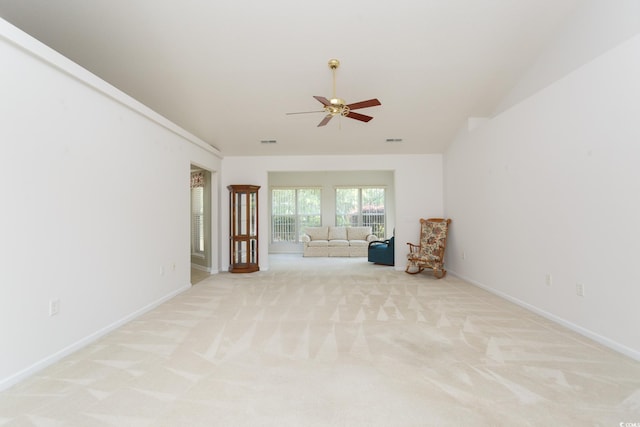 1044 Vestry Dr, Murrells Inlet, SC 29576 - spare room with ceiling fan, light carpet, baseboards, and vaulted ceiling