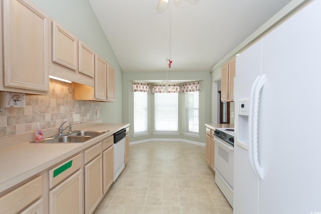 1044 Vestry Dr, Murrells Inlet, SC 29576 - kitchen with white appliances, a sink, tasteful backsplash, light countertops, and lofted ceiling