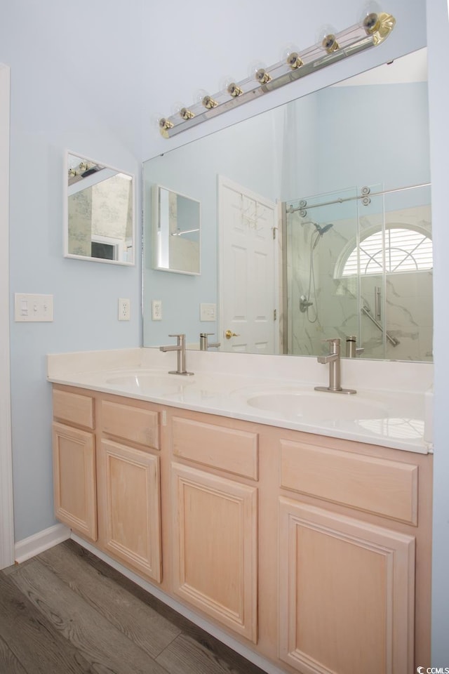 1044 Vestry Dr, Murrells Inlet, SC 29576 - bathroom with a marble finish shower, double vanity, wood finished floors, and lofted ceiling