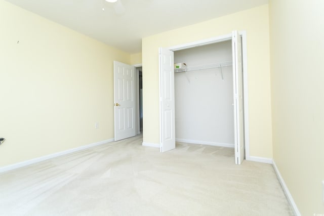 1044 Vestry Dr, Murrells Inlet, SC 29576 - unfurnished bedroom featuring light carpet, a closet, a ceiling fan, and baseboards