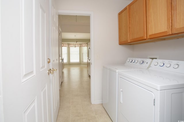 1044 Vestry Dr, Murrells Inlet, SC 29576 - laundry room featuring cabinet space, independent washer and dryer, and baseboards