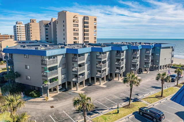 6000 N Ocean Blvd Unit 119, North Myrtle Beach, SC 29582 - view of apartment building / complex featuring uncovered parking