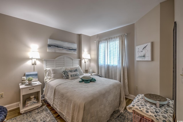 2100 Sea Mountain Hwy Unit 202, North Myrtle Beach, SC 29582 - bedroom featuring wood finished floors and baseboards