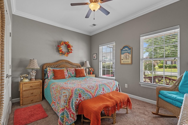 bedroom featuring ornamental molding, baseboards, carpet, and a ceiling fan
