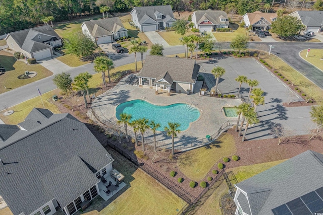 aerial perspective of suburban area with a pool