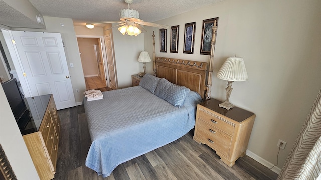 102 N Ocean Blvd Unit 405, North Myrtle Beach, SC 29582 - bedroom featuring dark wood-style floors, baseboards, and a textured ceiling