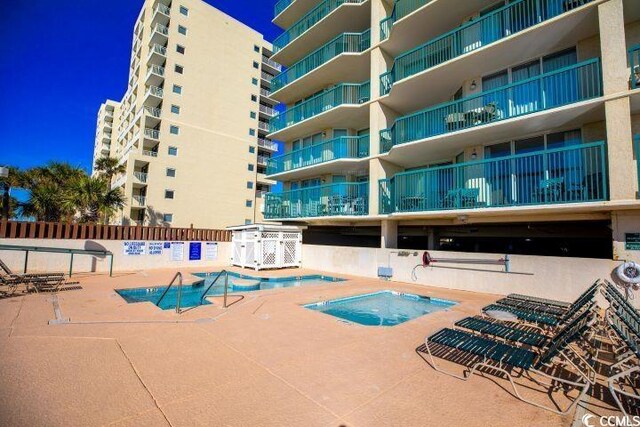 102 N Ocean Blvd Unit 405, North Myrtle Beach, SC 29582 - community pool with a patio area