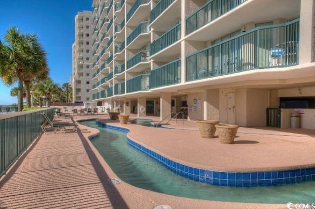 102 N Ocean Blvd Unit 405, North Myrtle Beach, SC 29582 - community pool with a patio
