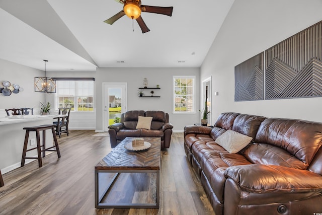 1451 Virginia Pine Dr, Longs, SC 29568 - living area with plenty of natural light, a chandelier, a ceiling fan, baseboards, and high vaulted ceiling