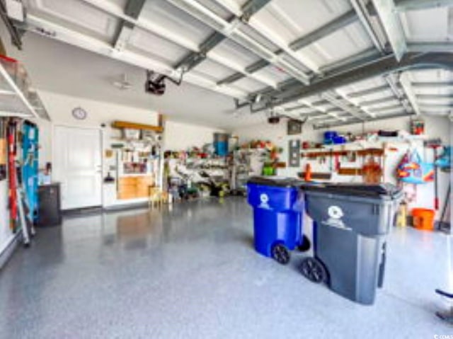 605 Ginger Lily Way, Little River, SC 29566 - garage with a garage door opener