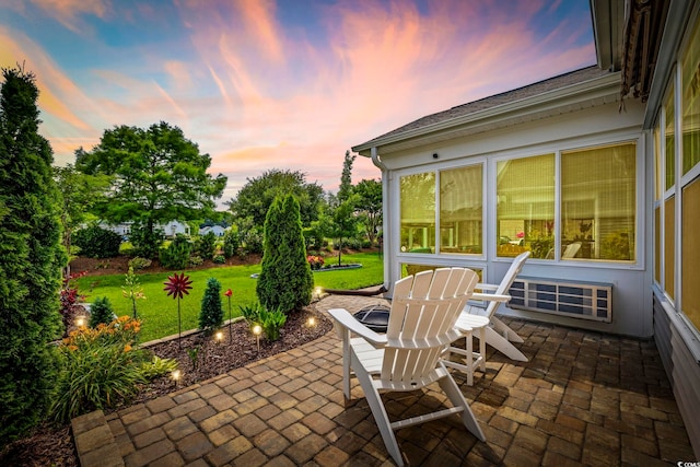 605 Ginger Lily Way, Little River, SC 29566 - patio terrace at dusk with a patio area and a lawn