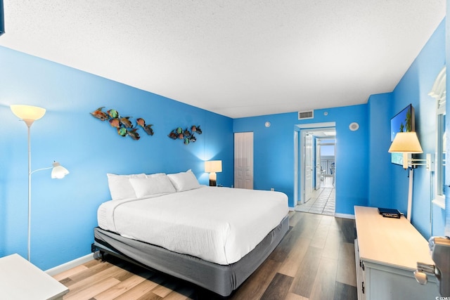 2801 S Ocean Blvd Unit 1634, North Myrtle Beach, SC 29582 - bedroom with wood finished floors, baseboards, and a closet