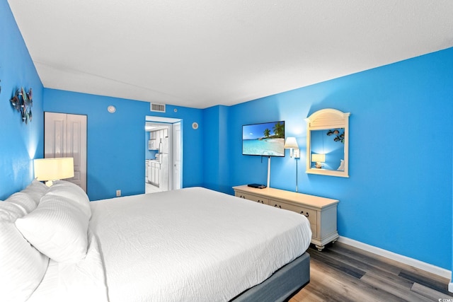 2801 S Ocean Blvd Unit 1634, North Myrtle Beach, SC 29582 - bedroom with wood finished floors and baseboards