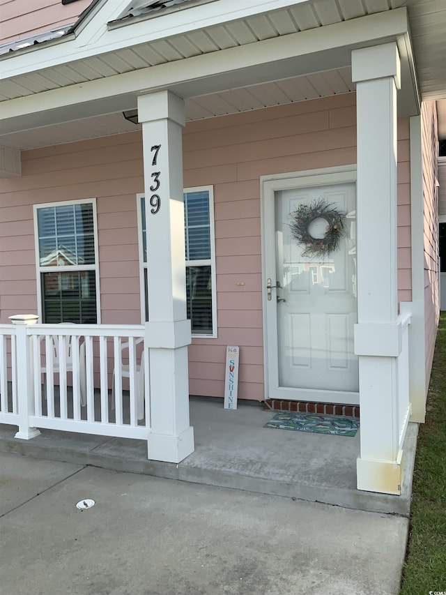 739 Shell Creek Cir Unit 739, North Myrtle Beach, SC 29582 - view of exterior entry with a porch