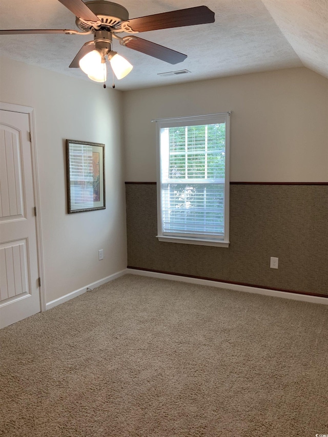 739 Shell Creek Cir Unit 739, North Myrtle Beach, SC 29582 - carpeted spare room with a textured ceiling, vaulted ceiling, and a ceiling fan