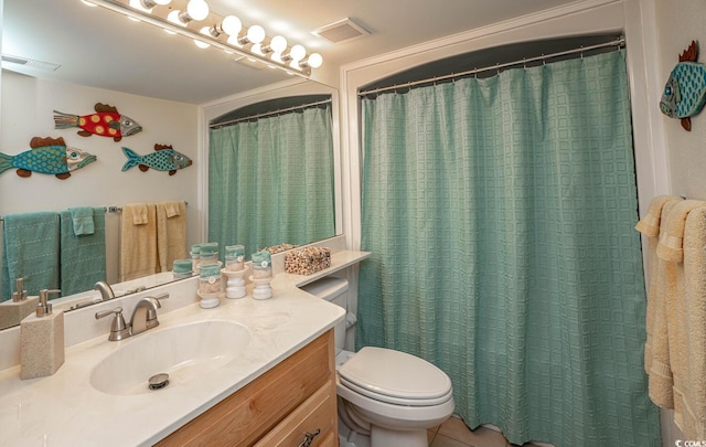 4440 Nassau Ct Unit 308, Little River, SC 29566 - full bath featuring vanity, toilet, and tile patterned floors