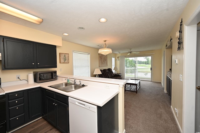 669 Tupelo Ln Unit 18D, Longs, SC 29568 - kitchen with dishwasher, black microwave, a peninsula, open floor plan, and light countertops