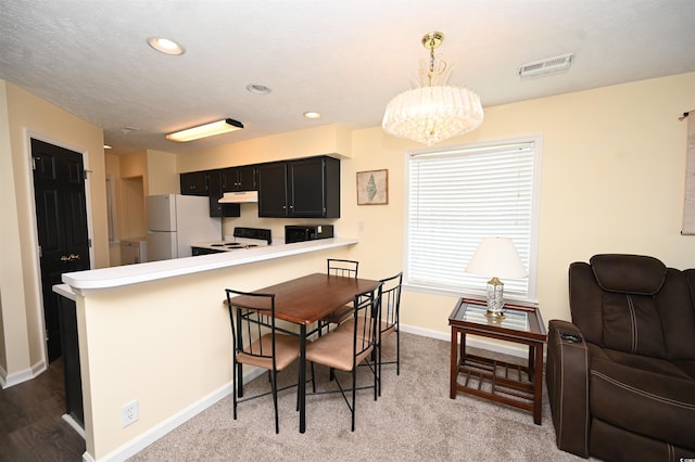 669 Tupelo Ln Unit 18D, Longs, SC 29568 - dining area featuring a chandelier and recessed lighting