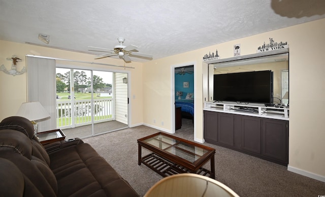 669 Tupelo Ln Unit 18D, Longs, SC 29568 - living area featuring carpet flooring, ceiling fan, and a textured ceiling