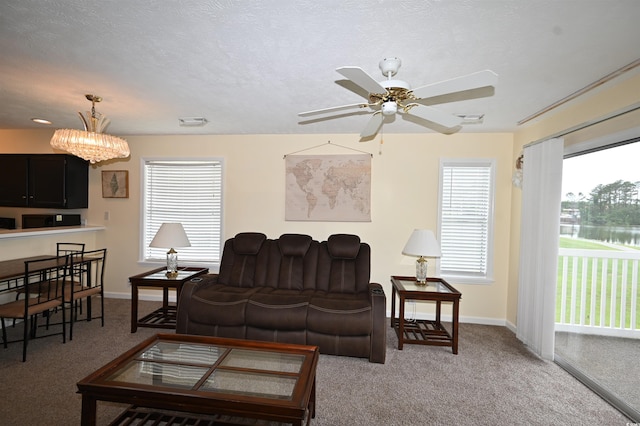 669 Tupelo Ln Unit 18D, Longs, SC 29568 - living room with light colored carpet, a ceiling fan, and a water view