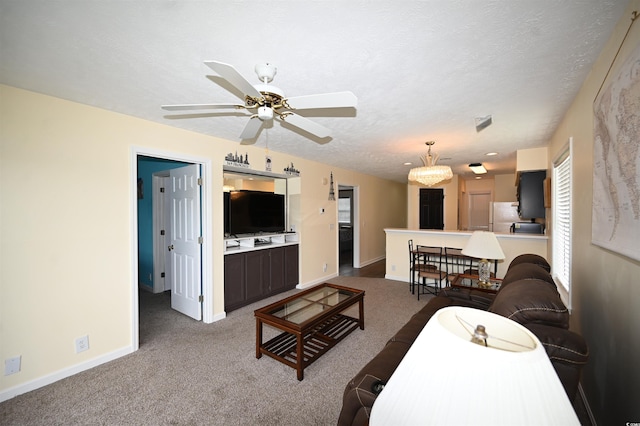 669 Tupelo Ln Unit 18D, Longs, SC 29568 - carpeted living area with baseboards and a ceiling fan