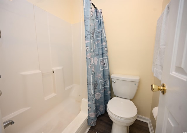 669 Tupelo Ln Unit 18D, Longs, SC 29568 - bathroom with wood finished floors and shower / bath combo with shower curtain