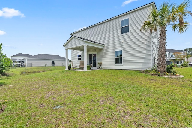 205 Marsh Deer Pl, Surfside Beach, SC 29575 - back of property with a lawn