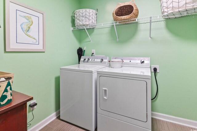 205 Marsh Deer Pl, Surfside Beach, SC 29575 - laundry room featuring washer and dryer and baseboards