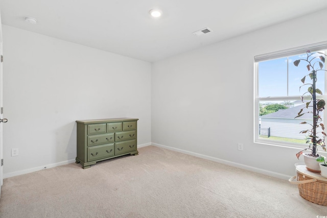 205 Marsh Deer Pl, Surfside Beach, SC 29575 - unfurnished bedroom featuring light carpet and baseboards