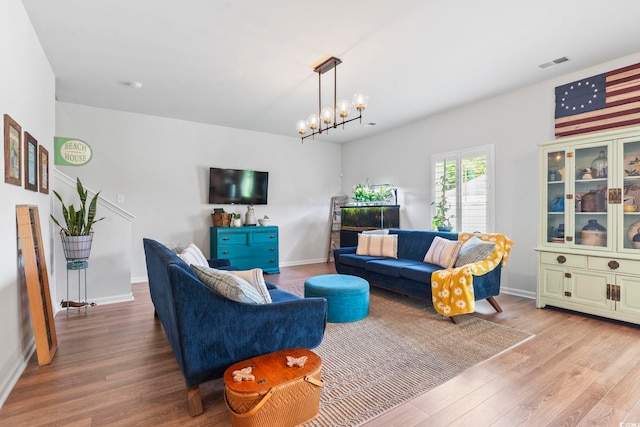 205 Marsh Deer Pl, Surfside Beach, SC 29575 - living area with wood finished floors and baseboards
