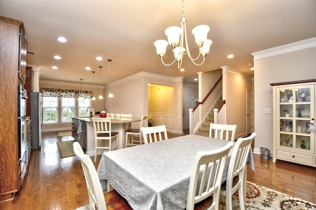 1141 Prescott Cir, Myrtle Beach, SC 29577 - dining room featuring ornamental molding, a chandelier, stairway, dark wood-style floors, and recessed lighting