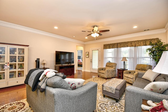 1141 Prescott Cir, Myrtle Beach, SC 29577 - living area featuring ornamental molding, a ceiling fan, wood finished floors, recessed lighting, and baseboards