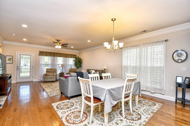 1141 Prescott Cir, Myrtle Beach, SC 29577 - dining space with crown molding, hardwood / wood-style flooring, a chandelier, baseboards, and recessed lighting