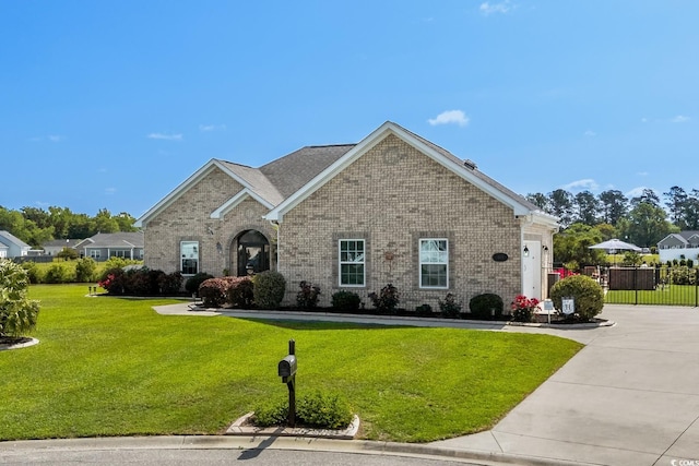 view of front of house with brick siding, concrete driveway, and an attached garage