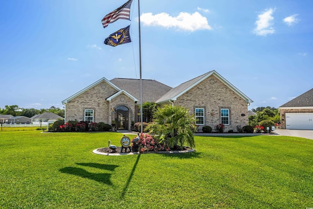 traditional home featuring brick siding and a front lawn