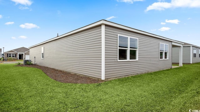 2859 Riverboat Way, Conway, SC 29526 - view of side of property featuring a yard and central AC