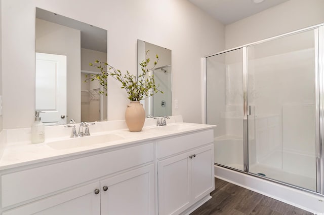 2859 Riverboat Way, Conway, SC 29526 - bathroom with a stall shower, double vanity, and wood finished floors