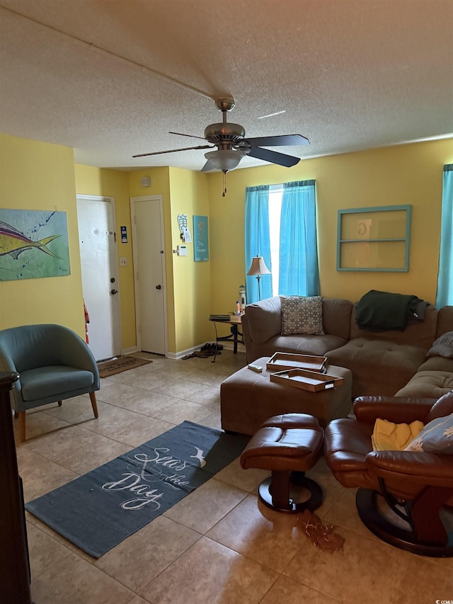 2005 Greens Blvd Unit F-205, Myrtle Beach, SC 29577 - tiled living area featuring ceiling fan and a textured ceiling