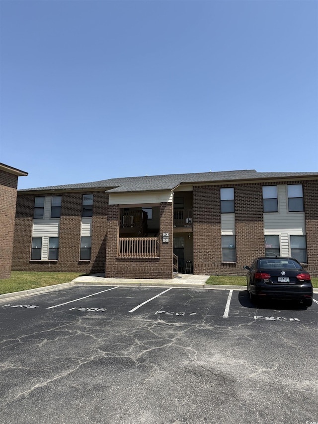 2005 Greens Blvd Unit F-205, Myrtle Beach, SC 29577 - view of property with uncovered parking