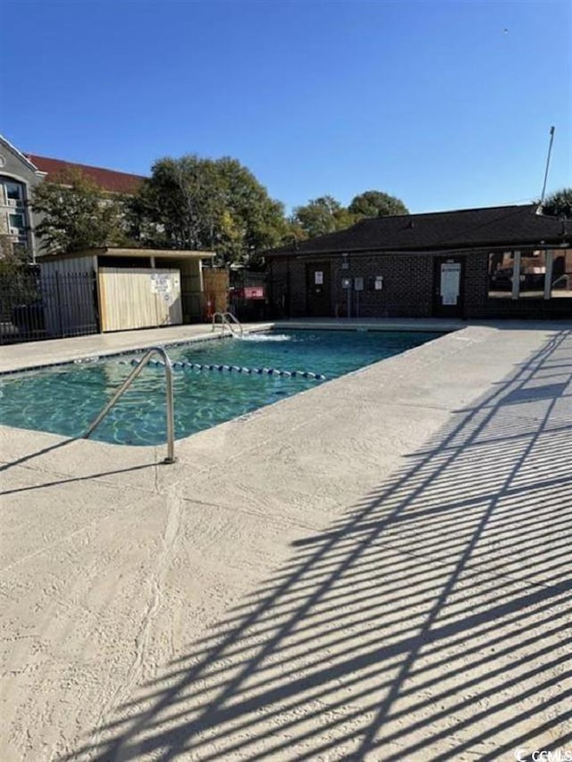 2005 Greens Blvd Unit F-205, Myrtle Beach, SC 29577 - community pool with a patio