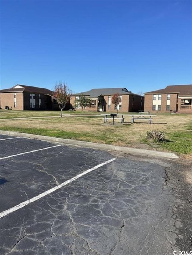 2005 Greens Blvd Unit F-205, Myrtle Beach, SC 29577 - view of uncovered parking lot
