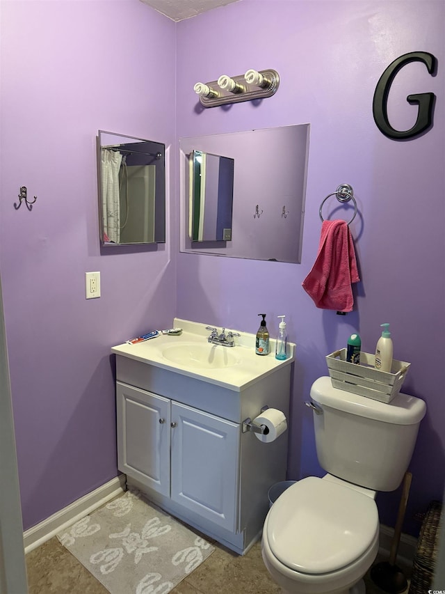 2005 Greens Blvd Unit F-205, Myrtle Beach, SC 29577 - bathroom with vanity, toilet, and baseboards