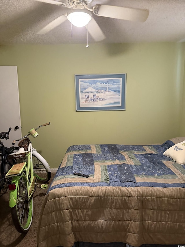2005 Greens Blvd Unit F-205, Myrtle Beach, SC 29577 - bedroom with carpet flooring, a ceiling fan, and a textured ceiling