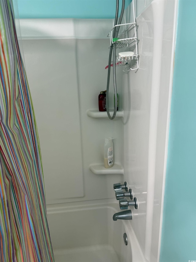 2005 Greens Blvd Unit F-205, Myrtle Beach, SC 29577 - bathroom featuring shower / bath combo with shower curtain
