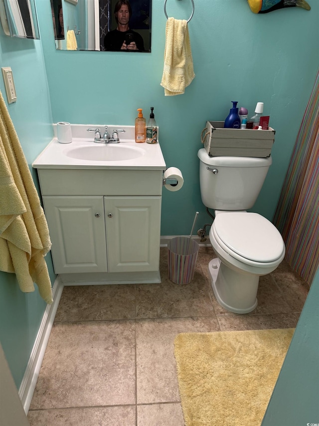2005 Greens Blvd Unit F-205, Myrtle Beach, SC 29577 - bathroom featuring toilet, vanity, and baseboards