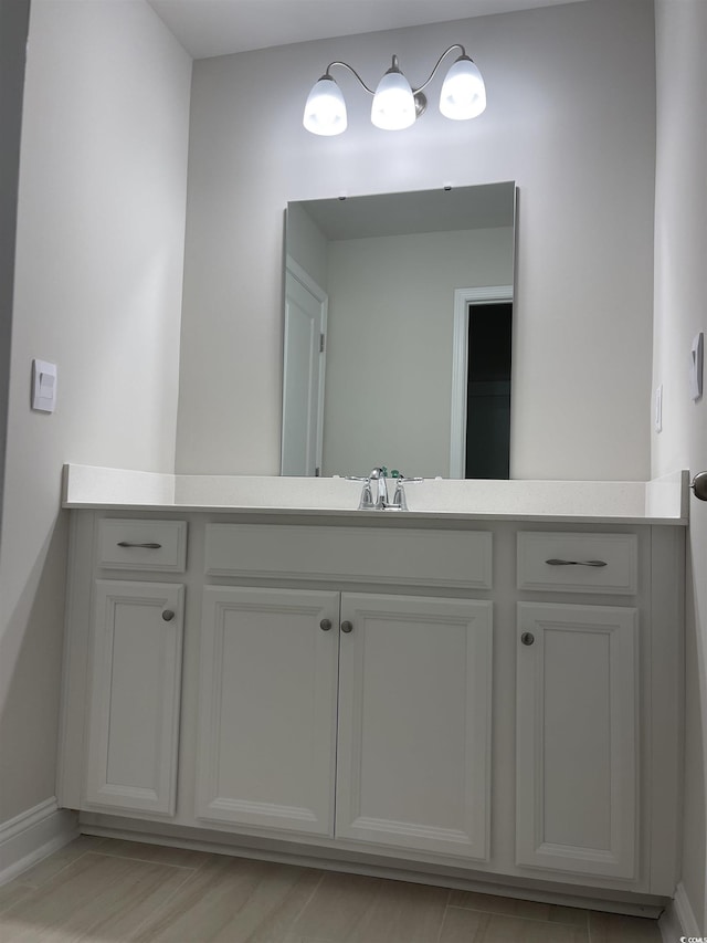 3391 Moss Bridge Ln, Myrtle Beach, SC 29579 - bathroom featuring baseboards and vanity