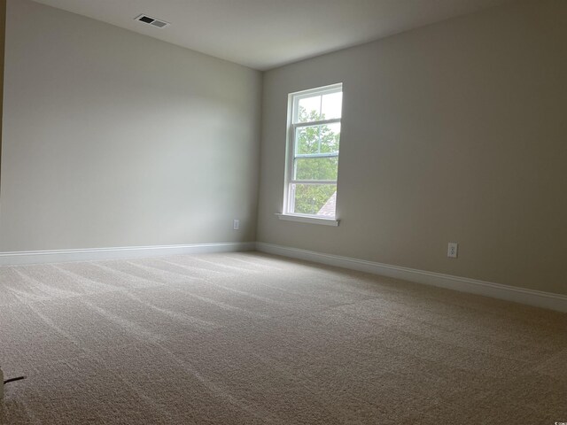 3391 Moss Bridge Ln, Myrtle Beach, SC 29579 - carpeted empty room with baseboards