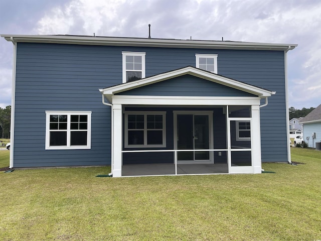 3391 Moss Bridge Ln, Myrtle Beach, SC 29579 - back of house with a sunroom and a lawn