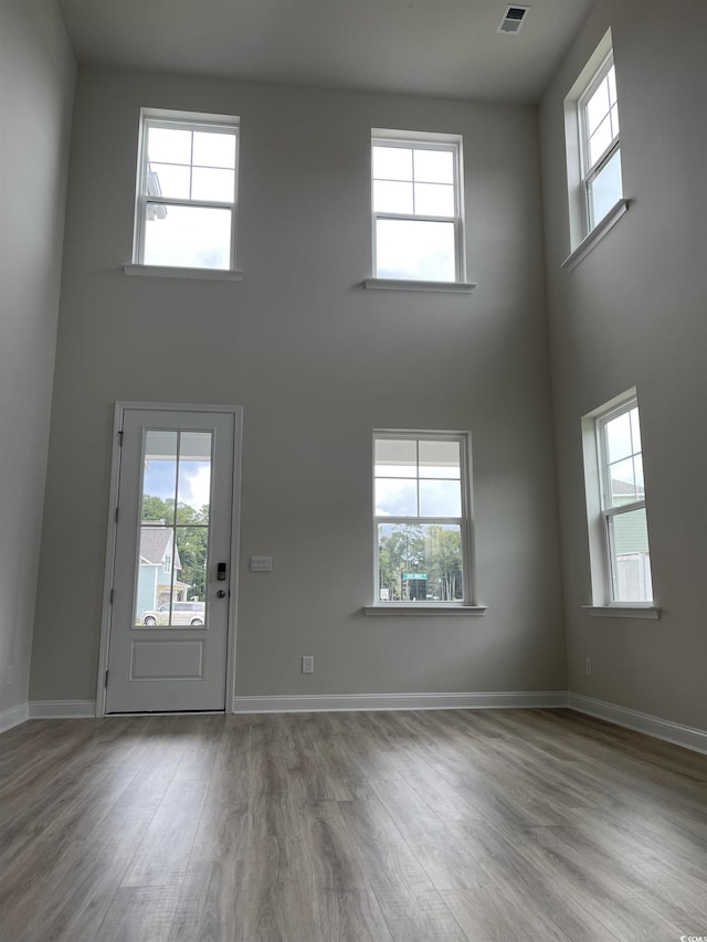 3391 Moss Bridge Ln, Myrtle Beach, SC 29579 - entryway with a high ceiling, wood finished floors, and baseboards